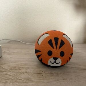 2 Amazon echo dots for kids tiger and panda.